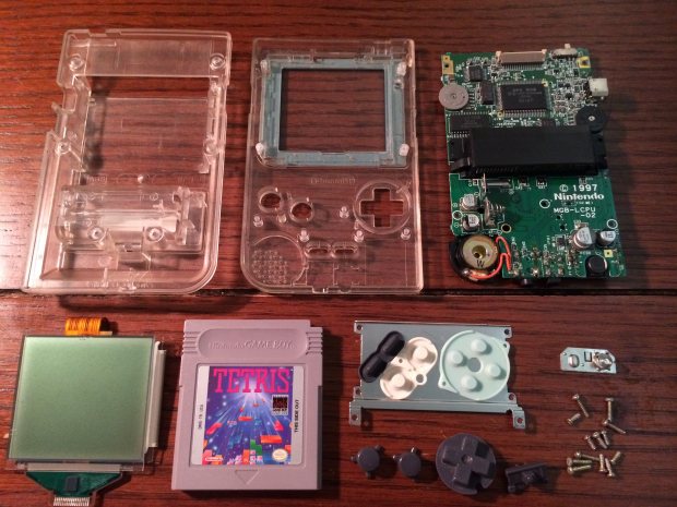 All of these parts, including the RPi and modified button pad fit nicely inside the Game Boy case.