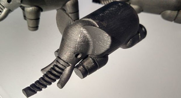image from Gizmodo. Print in place elephant model. Surface finish doesn't look that great, but we don't know what scale the model is. 