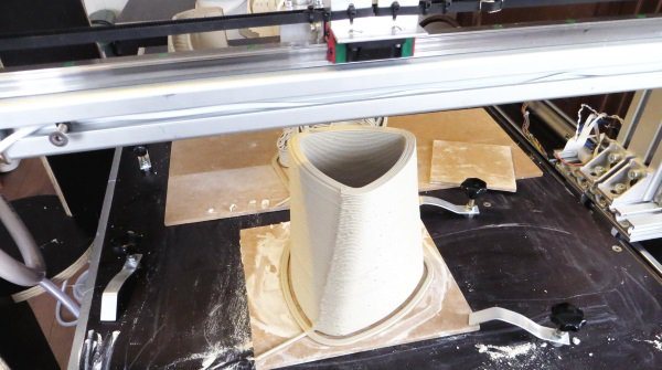 Vormvrij prints the clay layer by layer much like traditional 3D printers