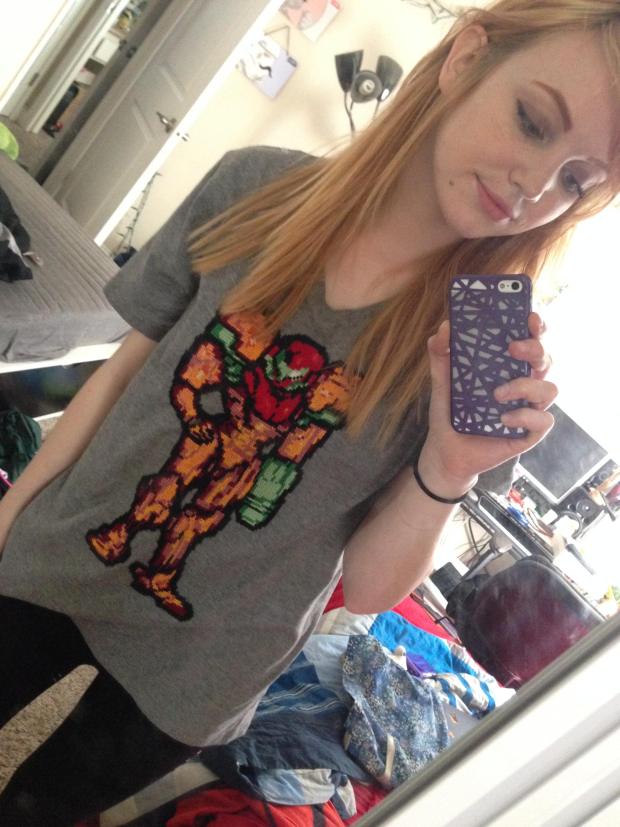 Amythelamey spent 4 weeks (2-hours a day) cross-stitching her Metroid Samus shirt at a resolution of 80 X 140 stiches or pixels.