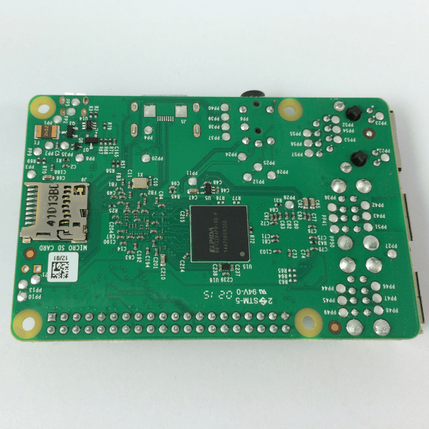 The rear of the new Raspberry Pi 2. The 1GB Micron B8132 SDRAM chip is visible in the center of the board.