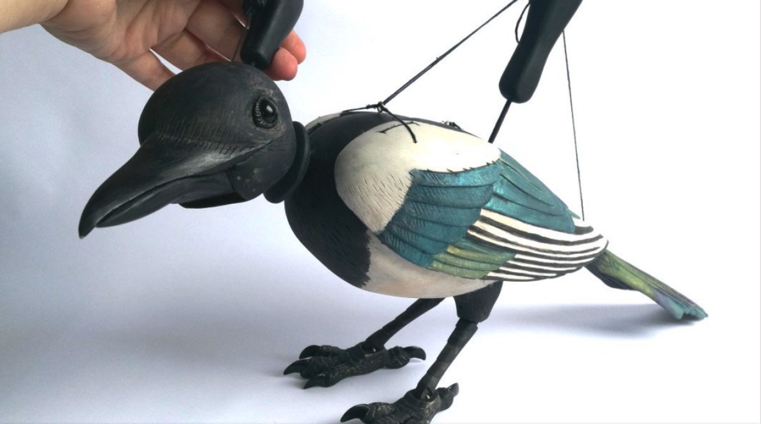 delightful-wood-magpie-puppet
